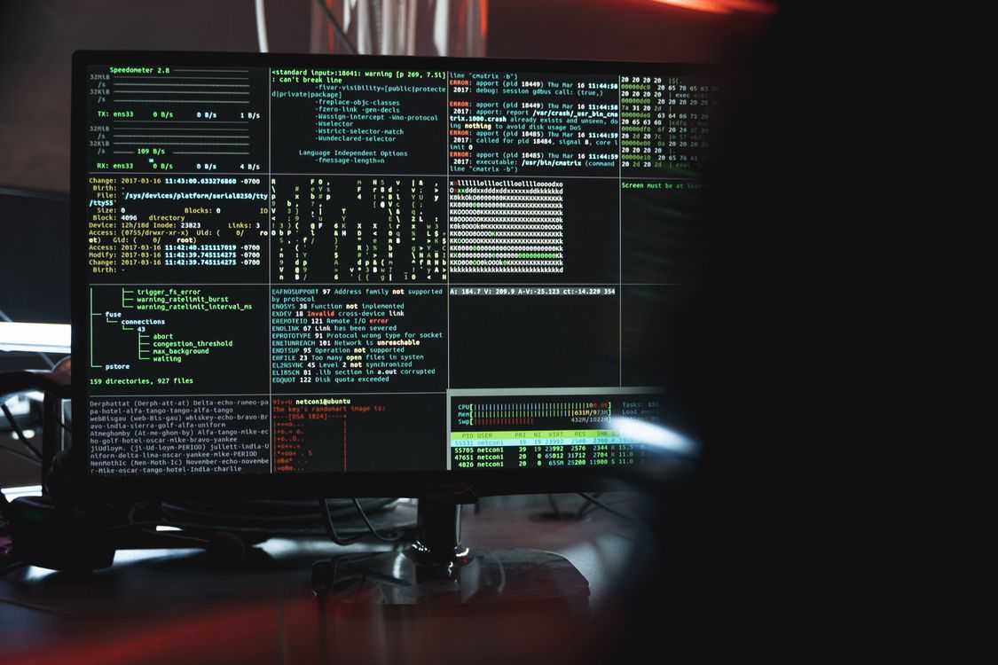 Analyst reviewing campaign traffic and security data on screen